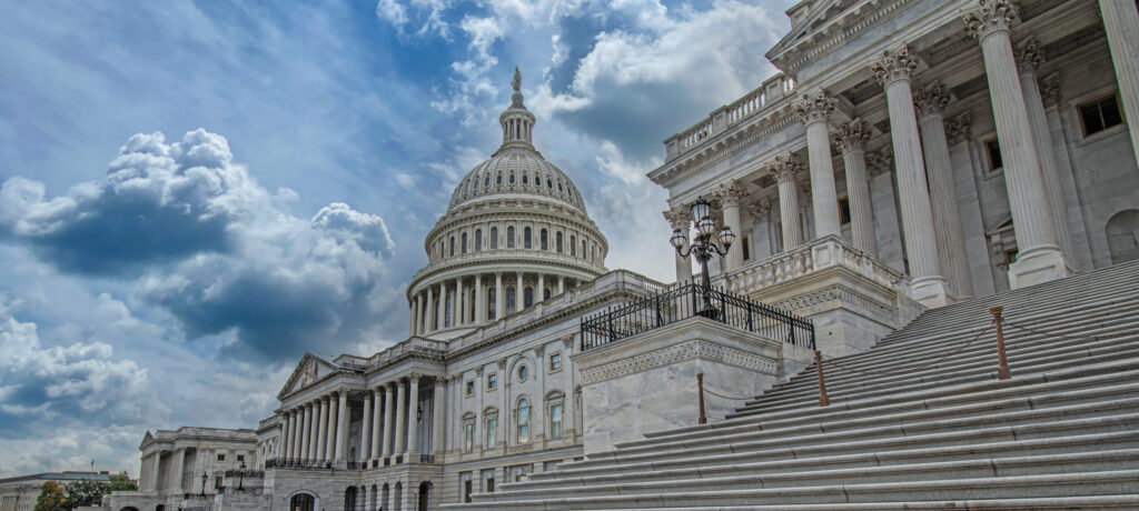 View of exterior capitol steps on a blue sky day